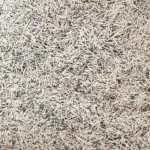Mixed tofu and bentonite cat litter granules close up by YoVia Pet Products